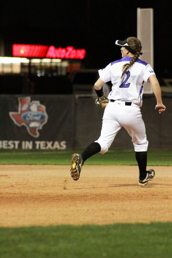 Marisa Flores running to protect second base.