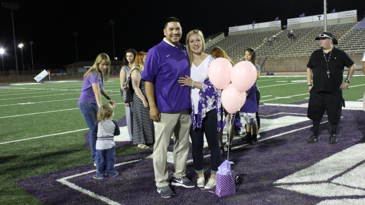 Coach proposes after gender reveal at game