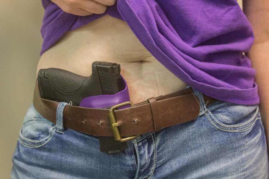 Example of a conceal carry position on an anonymous female model.