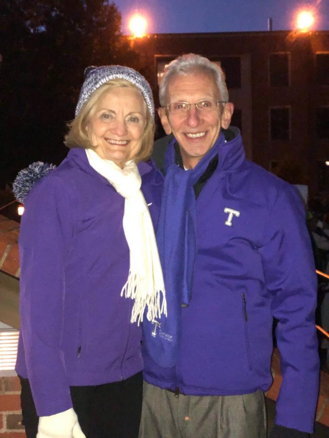 Dr. Dottavio and Dr. Lisette Dottavio at the the annual tree lighting in front of the Dick Smith Library.