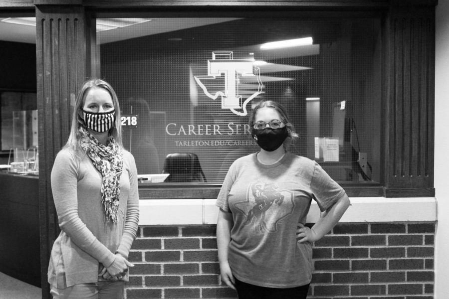 Alana Hefner and Kelli Murphy in front of the Career Services office where they work readily to help with any students you may have.
