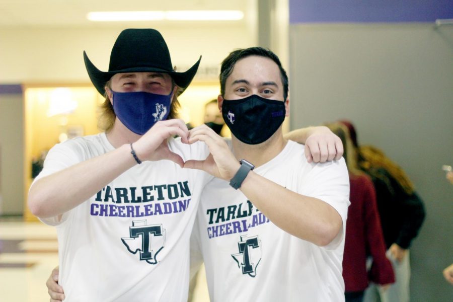 Elijah Perry Imbong, the previous Texan Rider, and his successor
Walker Kirk at Midnight Madness on Oct. 28, 2020.
