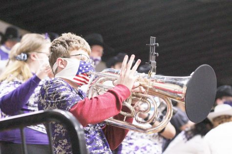 Chance Worthington playing the euphonium at midnight madness on Oct. 28 2020.