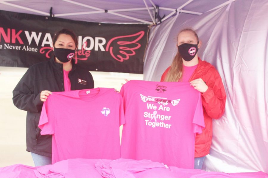 PWATX Founder and Executive Director, Julie Moser and Vice President and Director of Financial Aid, Elly Lynch selling shirts at the Tailgate before the Tarleton Pink Out Football game on Feb. 27, 2021.
