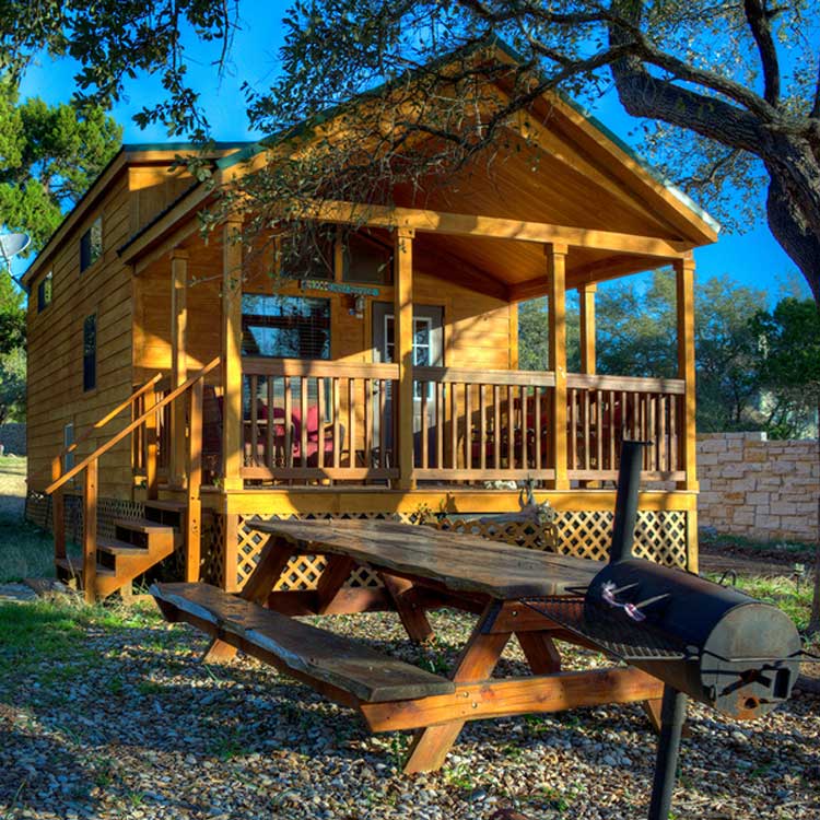 The+Lakeside+Lodge+is+a+520+square+foot+cabin+win+one+private+queen+sized+bed+and+a+loft+with+two+queen+size+beds+and+a+fold+twin+size+bed.+The+Lakeside+Lodge+overlooks+Lake+Travis+is+stocked+with+a+kitchen%2C+full+bathroom%2C+flat+screen+television+and+outdoor+picnic+area.+